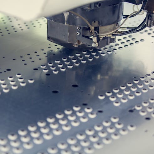 Perforated sheets. Image Credit: Shutterstock.com/BigBlueStudio
