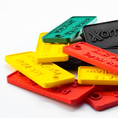 Samples of SLS PA12 dyed in various colors.